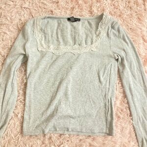 Coquette grey long sleeve top with lace trim
